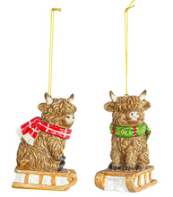 Load image into Gallery viewer, HIGHLAND CALF SLEDDER ORNAMENT
