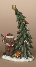 Load image into Gallery viewer, HIGHLAND COW SITTING BY TREE FIGURE
