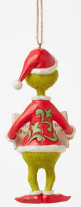 GRINCH HOLDING BOOK ORNAMENT