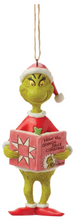 Load image into Gallery viewer, GRINCH HOLDING BOOK ORNAMENT

