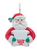 Load image into Gallery viewer, SANTA WITH NICE &amp; NAUGHTY LIST ORNAMENT
