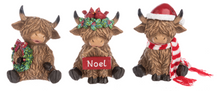 Load image into Gallery viewer, HOLIDAY HIGHLAND COW FIGURINE
