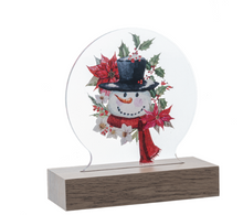 Load image into Gallery viewer, LED LIGHT UP SNOWMAN IN POINSETTIA TABLETOP DÉCOR`
